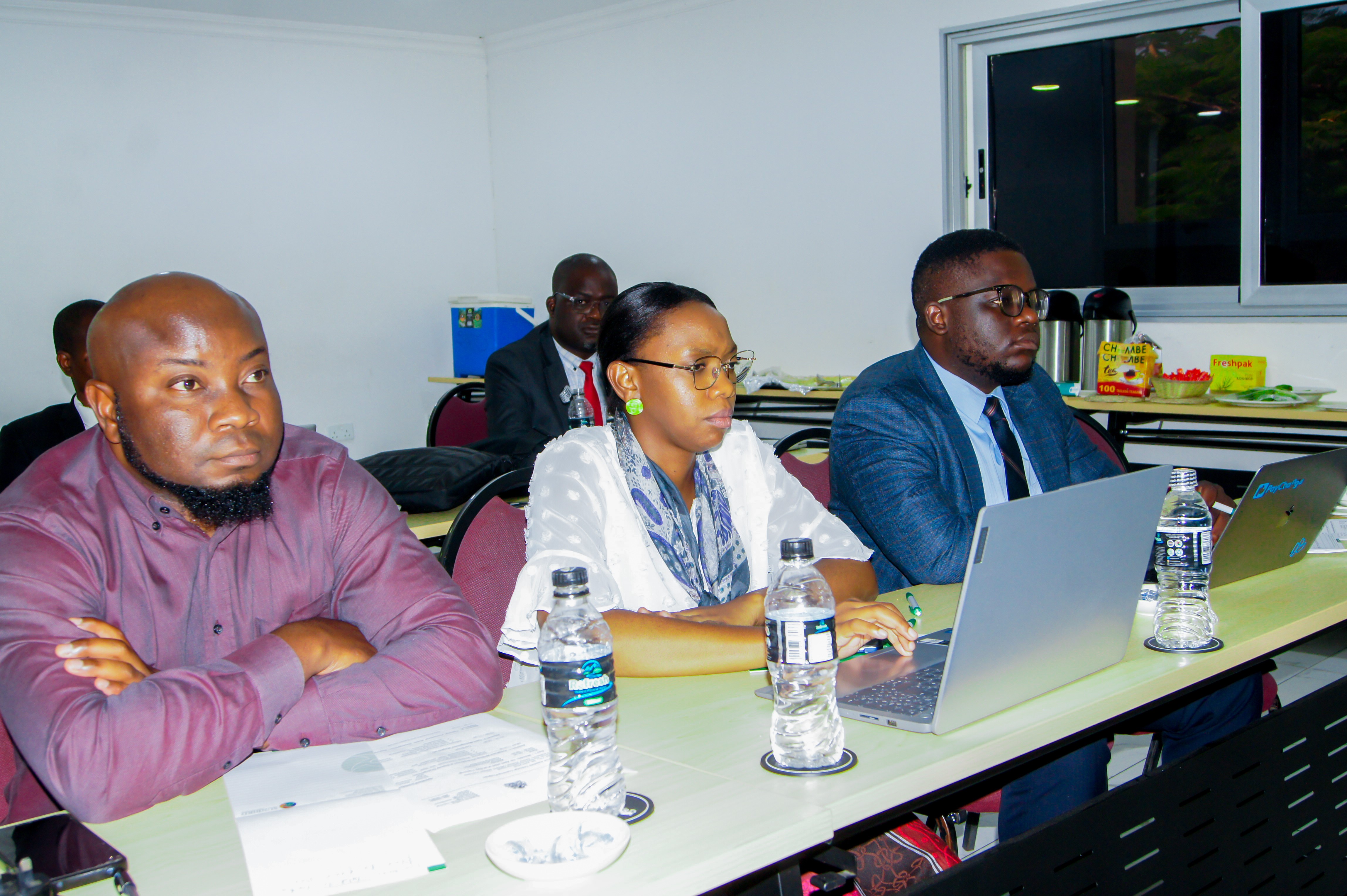 Researchers attentively listening to His Honour Shaibu Wahabi from Malawi Judiciary
